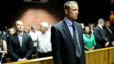 Oscar Pistorius, accusé de meurtre avec préméditation, au tribunal de Pretoria, le 19 février 2013