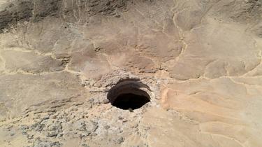 Vue aérienne du mystérieux puits de Barhout, au Yémen, le 6 juin 2021 [- / AFP]