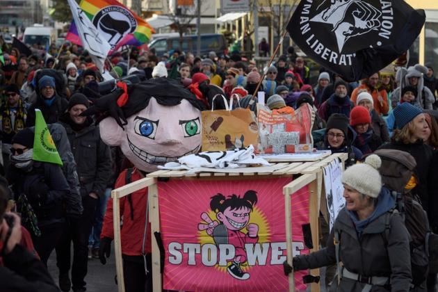 Un rassemblement d'activistes du climat le 19 janvier 2020 à Landquart (Suisse), au départ d'une marche vers Davos où s'ouvrira le World Economic Forum le 21 janvier [FABRICE COFFRINI / AFP]