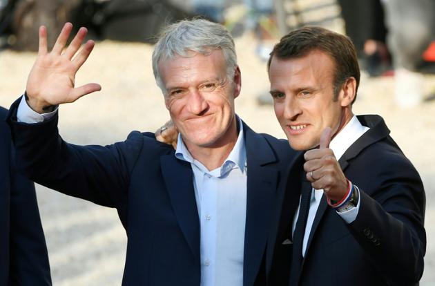 Emmanuel Macron et Didier Deschamps lors de la réception des Bleus champions du monde à l'Elysée, le 16 juillet 2018 [Lionel BONAVENTURE / AFP]