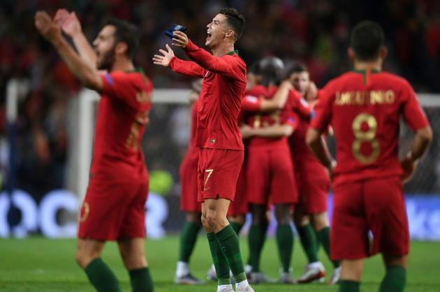 Les Portugais vainqueurs de la première Ligue des nations contre les Pays-Bas à Porto, le 9 juin 2019 [PATRICIA DE MELO MOREIRA / AFP]