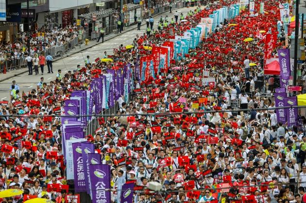 Manifestation contre un projet de loi d'extradition vers la Chine continentale, le 9 juin 2019 à Hong Kong<br />
 [DALE DE LA REY / AFP]