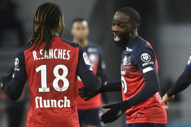 Renato Sanches et Jonathan Ikoné ont inscrit les deux buts de Lille ans la victoire sur Montpellier à Villeneuve-d'Ascq, le 13 décembre 2019 [FRANCOIS LO PRESTI / AFP]