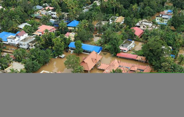 Un quartier situé dans le nord de Cochin, principale ville de l'Etat indien du Kerala, inondé après des pluies torrentielles, le 18 août 2018 [- / AFP]