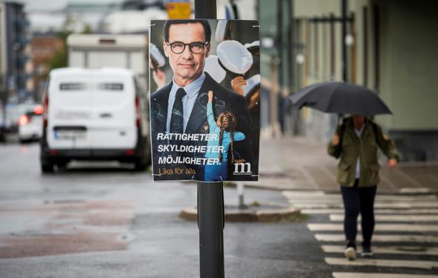 Affiche électorale d'Ulf Kristersson, chef du parti conservateur des Modérés en Suède, à Stockholm le 31 août 2018 [Jonathan NACKSTRAND / AFP]