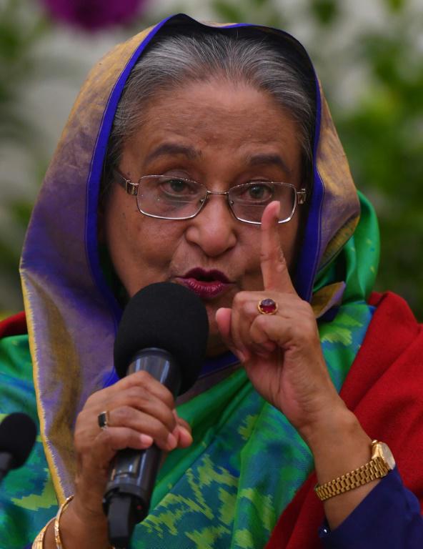 La Première ministre du Bangladesh Sheikh Hasina, reconduite, qui a remporté les législatives, a dit le 31 décembre 2018 avoir la "conscience tranquille" face aux accusations de fraude électorale [Indranil MUKHERJEE / AFP]