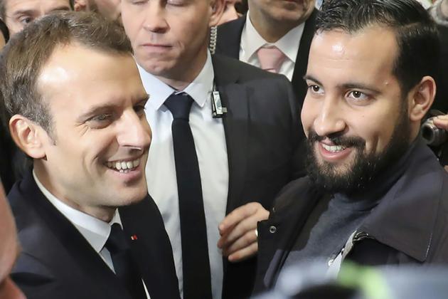 Emmanuel Macron (G) et Alexandre Benalla (D)  à Paris le 24 février 2018 [Ludovic MARIN / AFP/Archives]