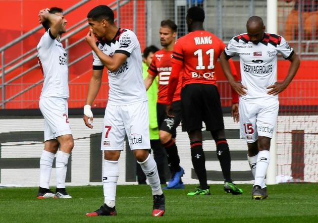 La détresse des joueurs guingampais à l'issue du match nul contre Rennes au Roazhon Park, le 12 mai 2019 [DAMIEN MEYER / AFP]