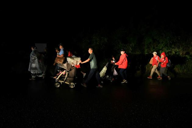 Des migrants honduriens en route pour les Etats-Unis, le 14 janvier 2019 à San Pedro Sula [ORLANDO SIERRA / AFP]