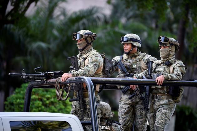 Des soldats patrouillent à Culiacan, dans l'état mexicain du Sinaloa, le 18 octobre 2019 [ALFREDO ESTRELLA / AFP]