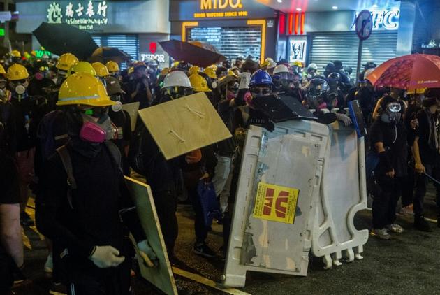 Des protestataires se massent dans le quartier de Causeway Bay, le 4 août 2019 à Hong Kong  [Isaac Lawrence / AFP]