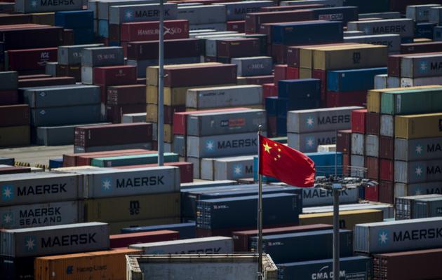 Des conteneurs dans le port chinois de Yangshan, à Shanghai, le 13 juillet 2018 [JOHANNES EISELE / AFP]