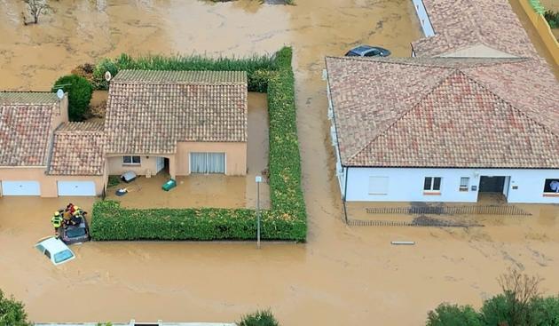 Photo diffusée par la Sécurité civile le 23 octobre 2019 de maisons inondées à Villeneuve-les-Béziers [- / Securite Civile 34/AFP]