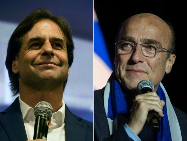 Les deux candidats au deuxième tour de l'élection présidentielle en Uruguay, Luis Lacalle Pou (g) et Daniel Martinez [EITAN ABRAMOVICH                    , PABLO PORCIUNCULA / AFP/Archives]