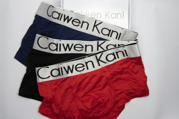 Des sous-vêtements imitant la marque Calvin Klein, vendues en Chine sous le nom de "Caiwen Kani", le 6 novembre 2018 [FRED DUFOUR / AFP]