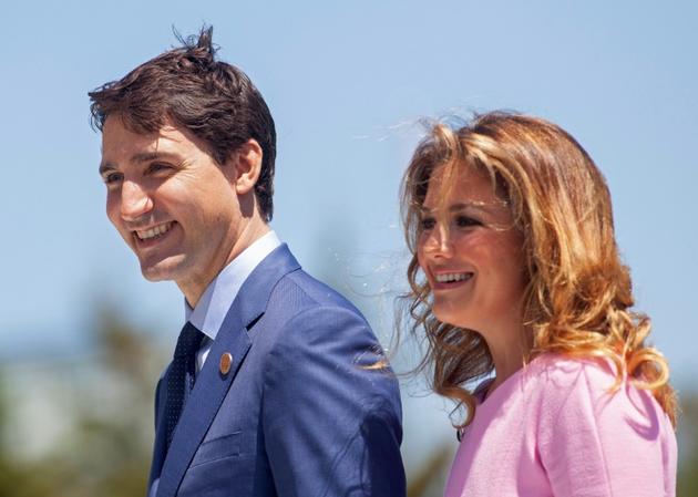 Le Premier ministre canadien Justin Trudeau (g) et son épouse Sophie Grégoire Trudeau le 8 juin 2018 à La Malbaie (Québec) [GEOFF ROBINS / AFP/Archives]