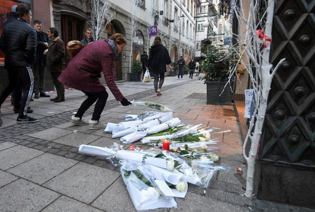 Hommages aux victimes le 12 décembre 2018 à Strasbourg, après l'attaque qui a endeuillé le marché de Noël [Patrick HERTZOG / AFP]