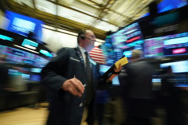 Des opérateurs à la Bourse de New York, le 12 mars 2020 [Bryan R. Smith / AFP]