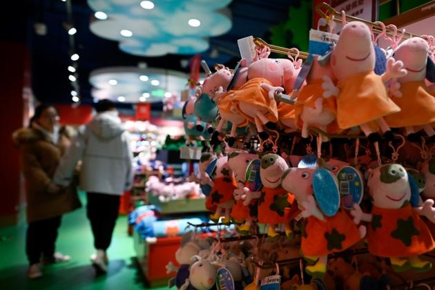 Des peluches Peppa Pig dans un magasin de jouets, le 25 janvier 2019 à Pékin [WANG Zhao / AFP/Archives]