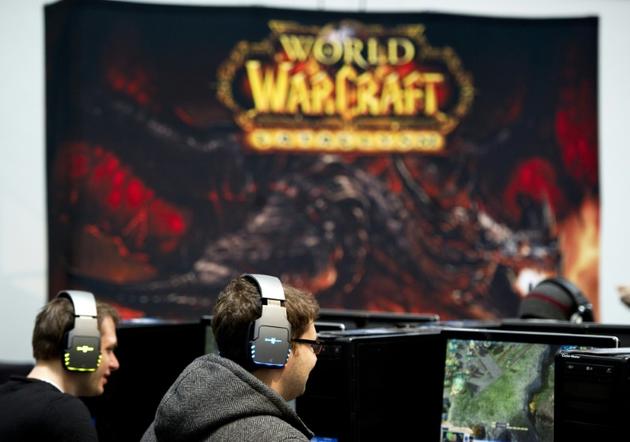Des joueurs au salon de la high tech CeBIT, à Hanovre, en Allemagne, jouent à World of Warcraft, le 3 mars 2011  [JOHANNES EISELE / AFP/Archives]