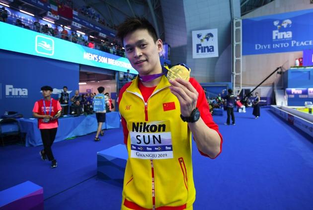 Le Chinois Sun Yang après son titre sur 200 m aux Mondiaux de natation de Gwangju, le 24 juillet 2019 [Ed JONES / AFP/Archives]