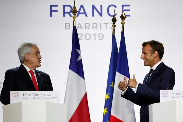 Emmanuel Macron et le président chilien Sebastian Pinera lors d'une conférence de presse à l'issue du sommet du G7 à Biarritz le 26 août 2019 [Francois Mori / POOL/AFP]