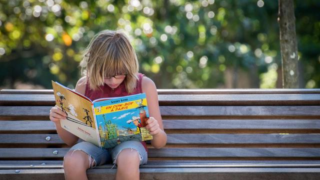 Les enfants lisent plus de BD que les adultes