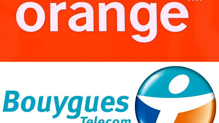 Les logos des opérateurs Orange et de Bouygues Telecom [Ben Stansall / AFP]