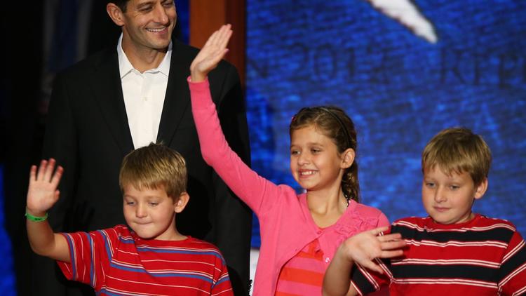 Paul Ryan, le colistier du candidat républicain à la Maison Blanche Mitt Romney et ses trois enfants, dont sa fille Liza, le 29 août 2012 à Tampa,en Floride [Mark Wilson / Getty Images/AFP/Archives]