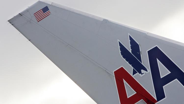Le logo de la compagnie American Airlines sur les ailes d'un avion [Joel Robine / AFP/Archives]