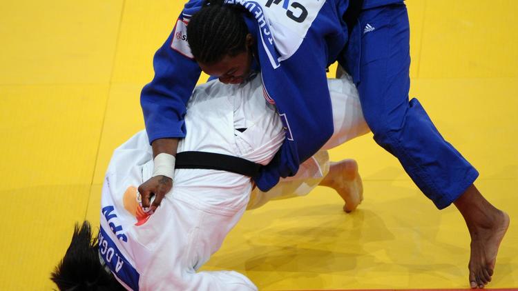 Cinq jours, cinq médailles: à Audrey Tcheuméo de ne pas faire baisser la moyenne des judokas français jeudi aux Jeux de Londres, avant l'entrée en lice du colosse Teddy Riner vendredi.[AFP]
