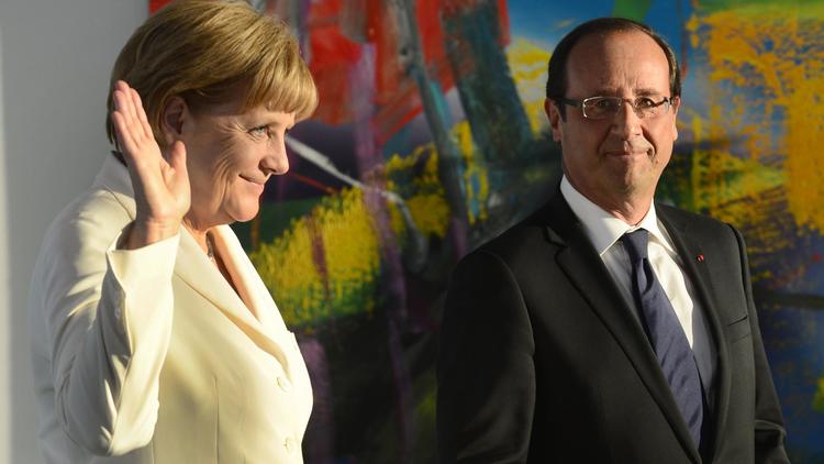 La chancelière Angela Merkel et le président François Hollande, le 23 août 2012 à Berlin [John Macdougall / AFP/Archives]