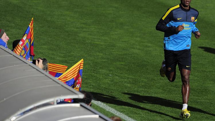 L'international français du FC Barcelone Eric Abidal s'entraîne à Barcelone le 4 janvier 2013 [Josep Lago / AFP/Archives]