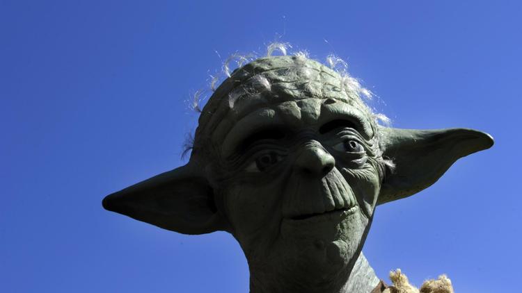 Un fan de Star Wars déguisé en Yoda [Miguel Riopa / AFP/Archives]