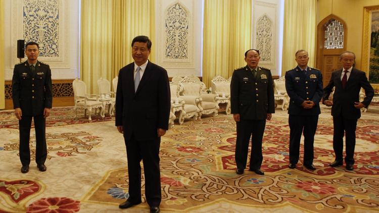 Le vice-président chinois Xi Jinping (2è g) et futur président de la République populaire de Chine, le 19 septembre 2012 à Pékin [Larry Downing / AFP/Archives]