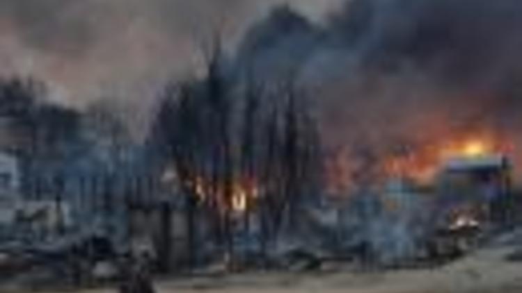 Maisons incendiées le 21 mars 2013 à Meiktila [Soe Than Win / AFP/Archives]