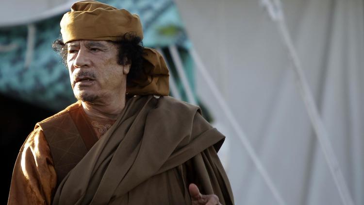 Mouammar Kadhafi à Tripoli en avril 2011, quelques mois avant sa mort pendant la révolution libyenne [Joseph Eid / AFP/Archives]