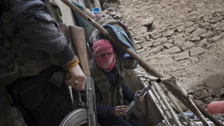 Des combattants rebelles le 16 février 2013 à Deir Ezzor [Zac Baillie / AFP/Archives]