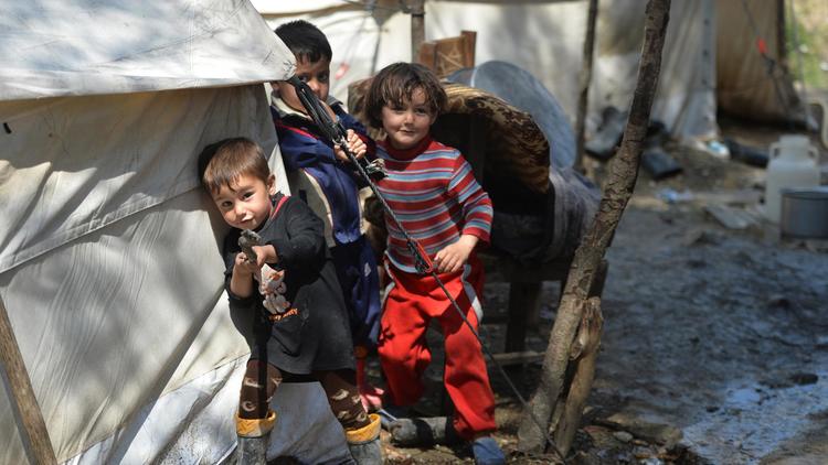 Des enfants dans un camp de réfugiés syriens le 23 avril 2013 à la frontière de la Syrie et de la Turquie [Miguel Medina / AFP/Archives]