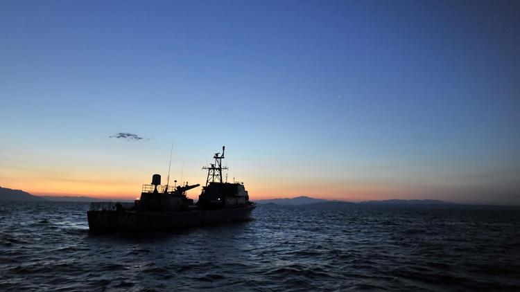 Un navire des gardes-côtes grecs en mer Egée [Aris Messinis / AFP/Archives]