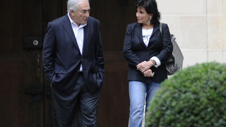L'ancien directeur du FMI Dominique Strauss-Kahn et Anne Sinclair, le 4 septembre 2011, à Paris [Miguel Medina / AFP/Archives]