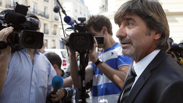 Michel Neyret arrive le 4 septembre 2012 au conseil de discipline de la police à Paris où il doit comparaître [Patrick Kovarik / AFP/Archives]