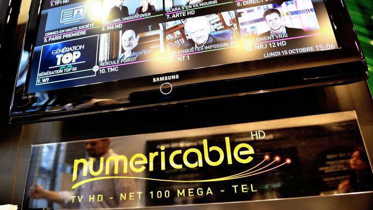 Mosaïque des chaînes télé diffusées par Numericable, sur un écran dans un magasin à Lille, en octobre 2012 [Philippe Huguen / AFP/Archives]