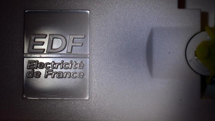 Le logo EDF sur un compteur électrique au domicile d'un particulier [Damien Meyer / AFP/Archives]