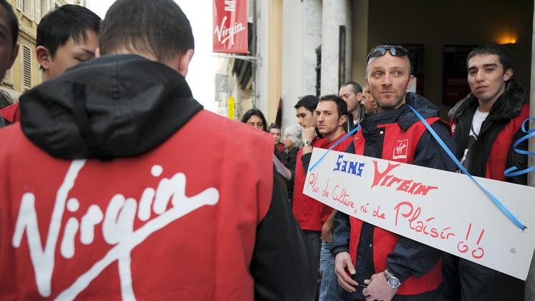 Des employés de Virgin manifestent à Marseille le 12 janvier 2013 [Anne-Christine Poujoulat / AFP/Archives]