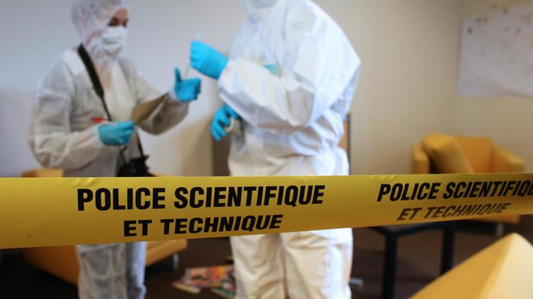 Des agents de la police scientifique lors d'un exercice, en janvier 2013 près de Paris [Thomas Samson / AFP/Archives]