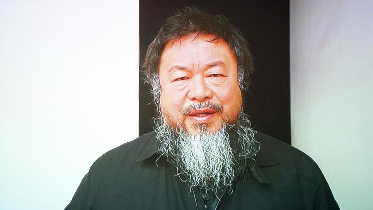 Ai Weiwei, le 1er février 2013, lorsqu'il annonce les gagnants du festival du film de Rotterdam [Robert Vos / AFP/Archives]