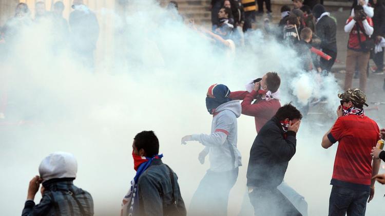 Incidents le 13 mai 2013 à Paris lors de la cérémonie organisée par le PSG pour fêter son titre de champion de France [Franck Fife / AFP]