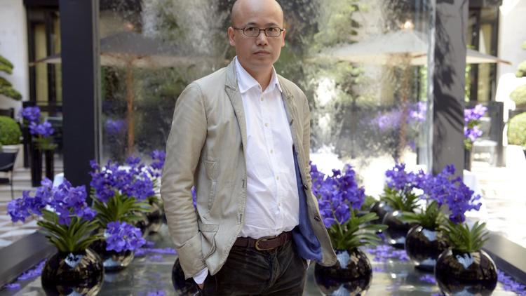 Le jeune styliste chinois Mao Jihong, le 6 juin 2013 à Paris, créateur de la marque Exception [Bertrand Guay / AFP]