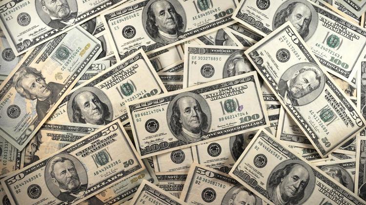 Des dollars [Karen Bleier / AFP/Archives]